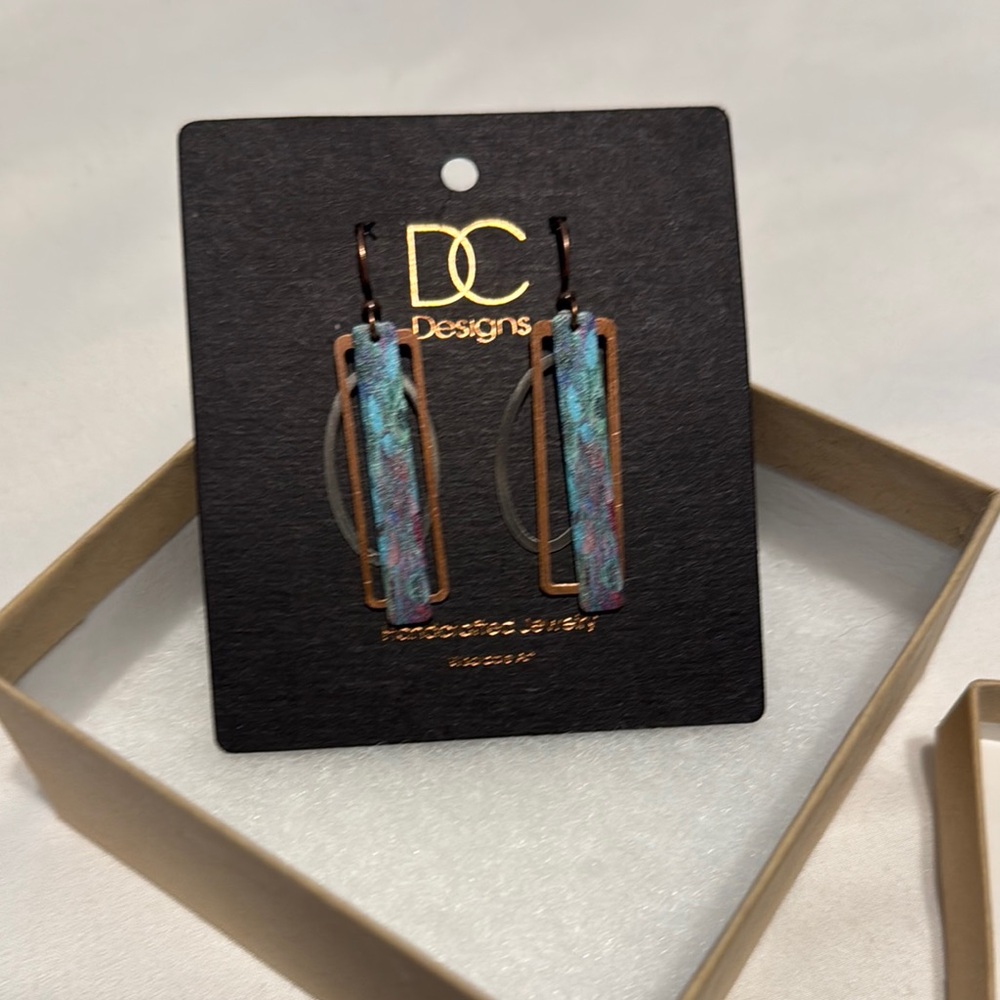 Handcrafted turquoise/bronze earrings. Perfect for dressing up denim!
